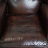 Very beautiful wing chair made of cowhide leather in English style