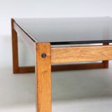Teak coffee table with smoked glass top