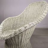 White rattan armchair and table