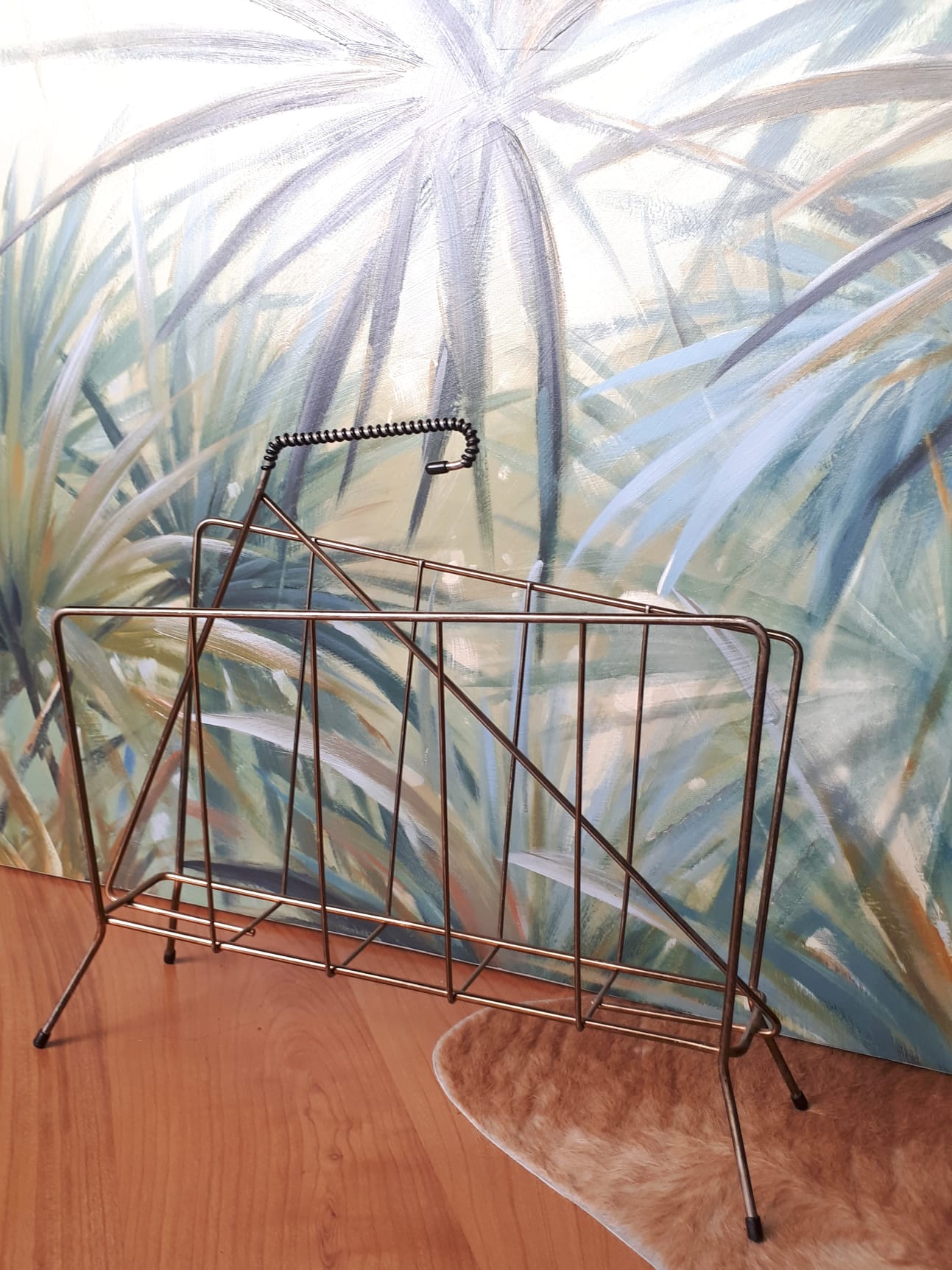 Gold metal newspaper holder