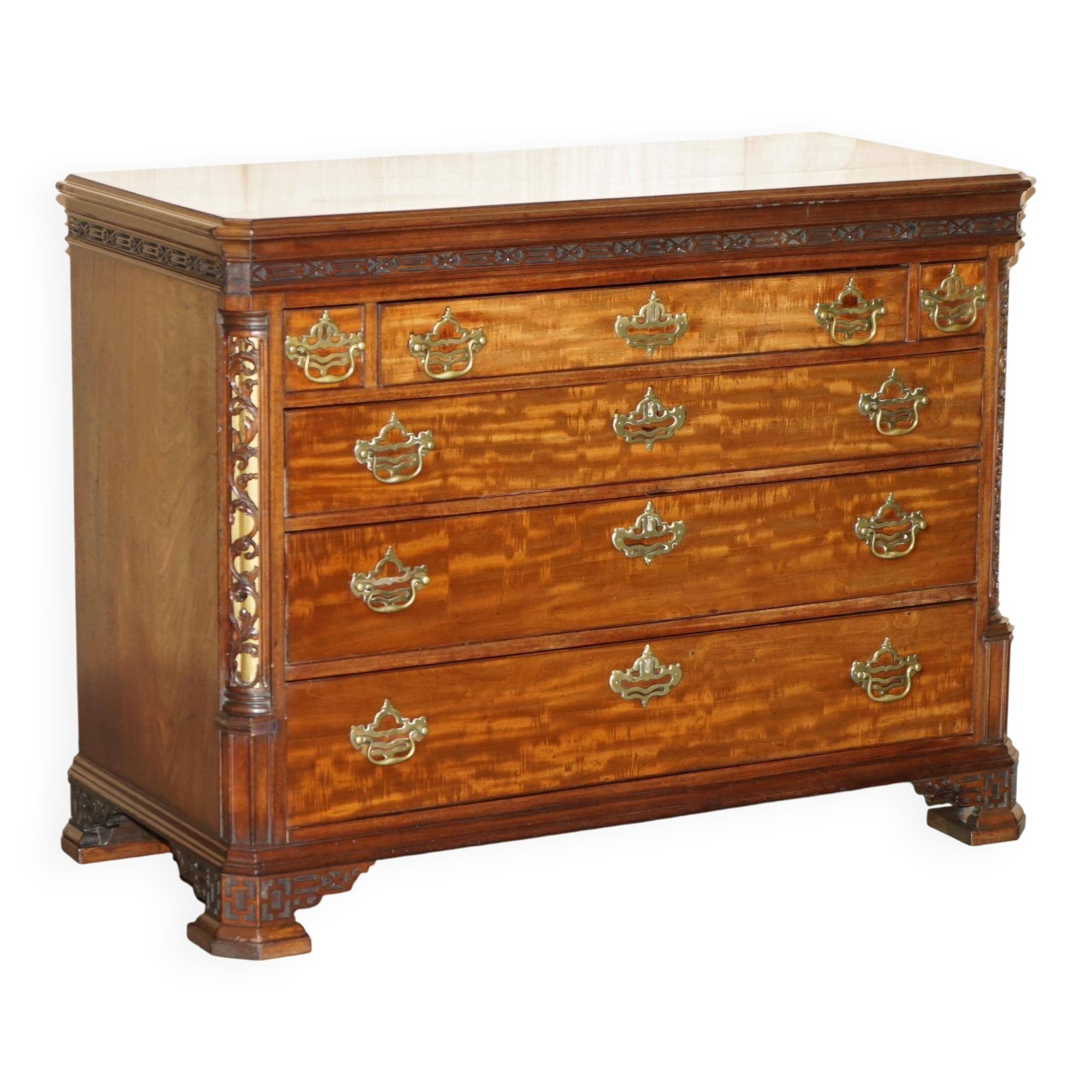 George III commode circa 1770 in walnut by Thomas Chippendale.