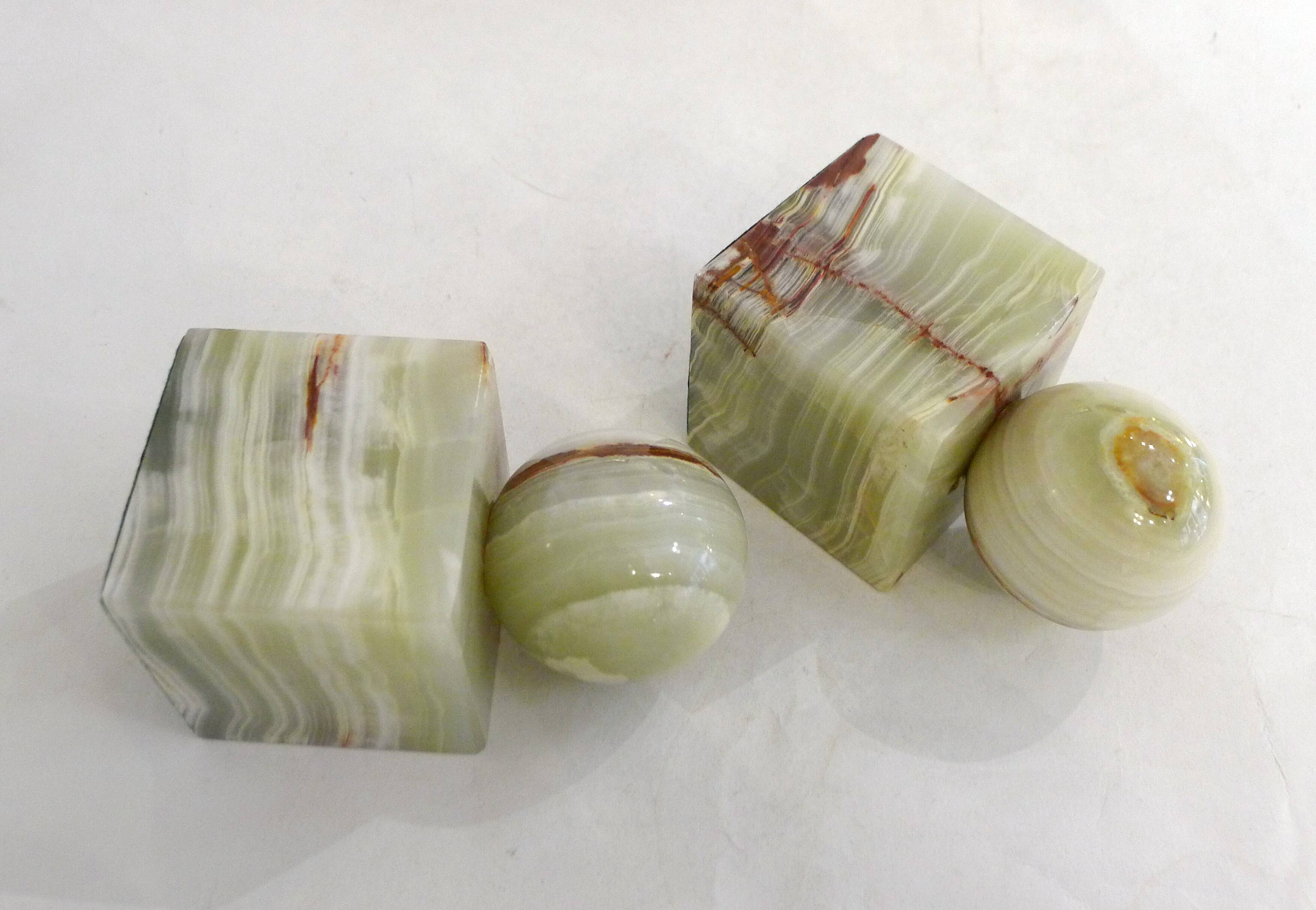 Pair of sculptural mid-century bookends in Onyx, Italy.