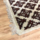 Tapis beige motifs ethniques - 157 x 91 cm