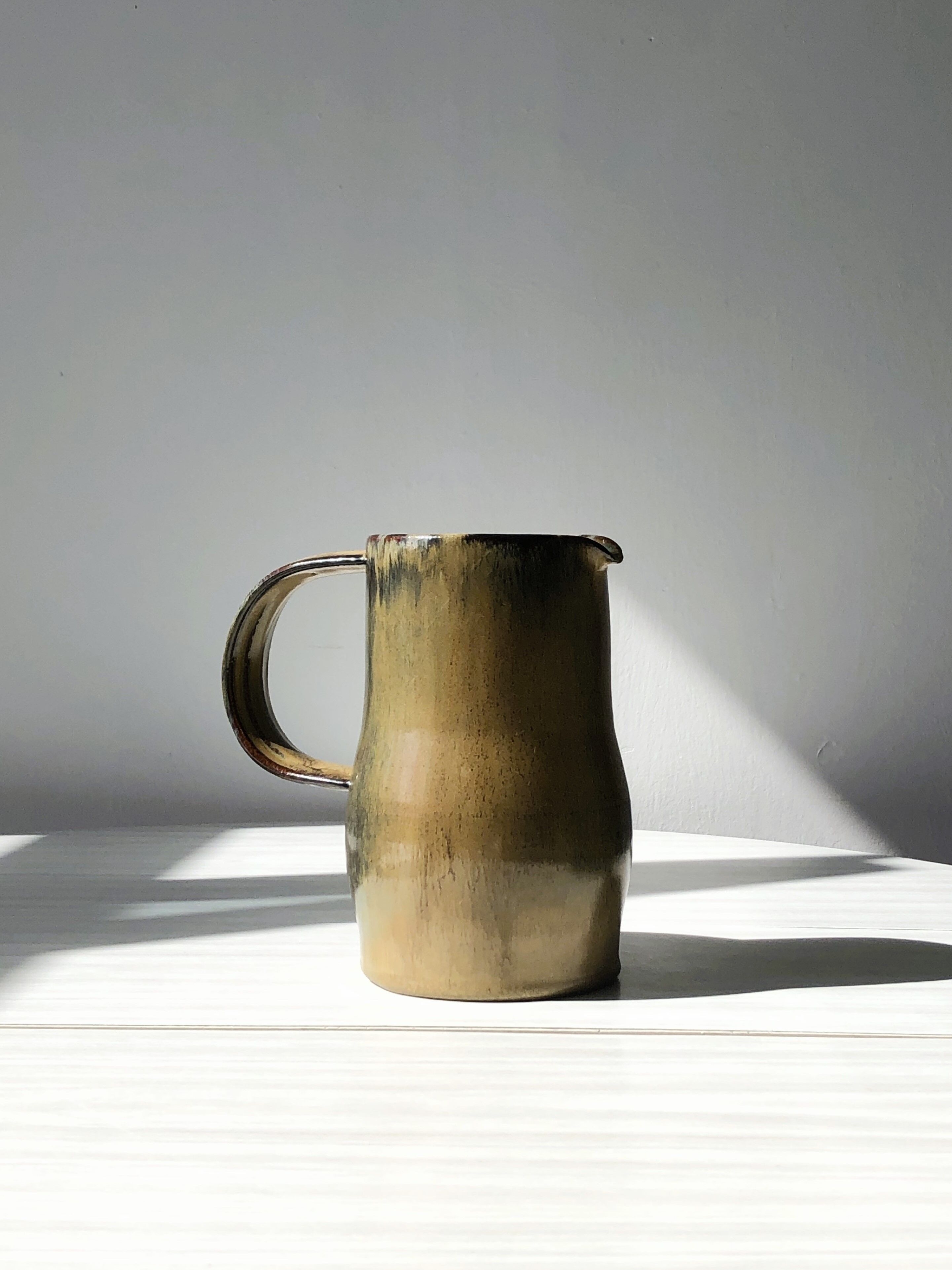 Ceramic spout decanter, brightly coloured and trendy