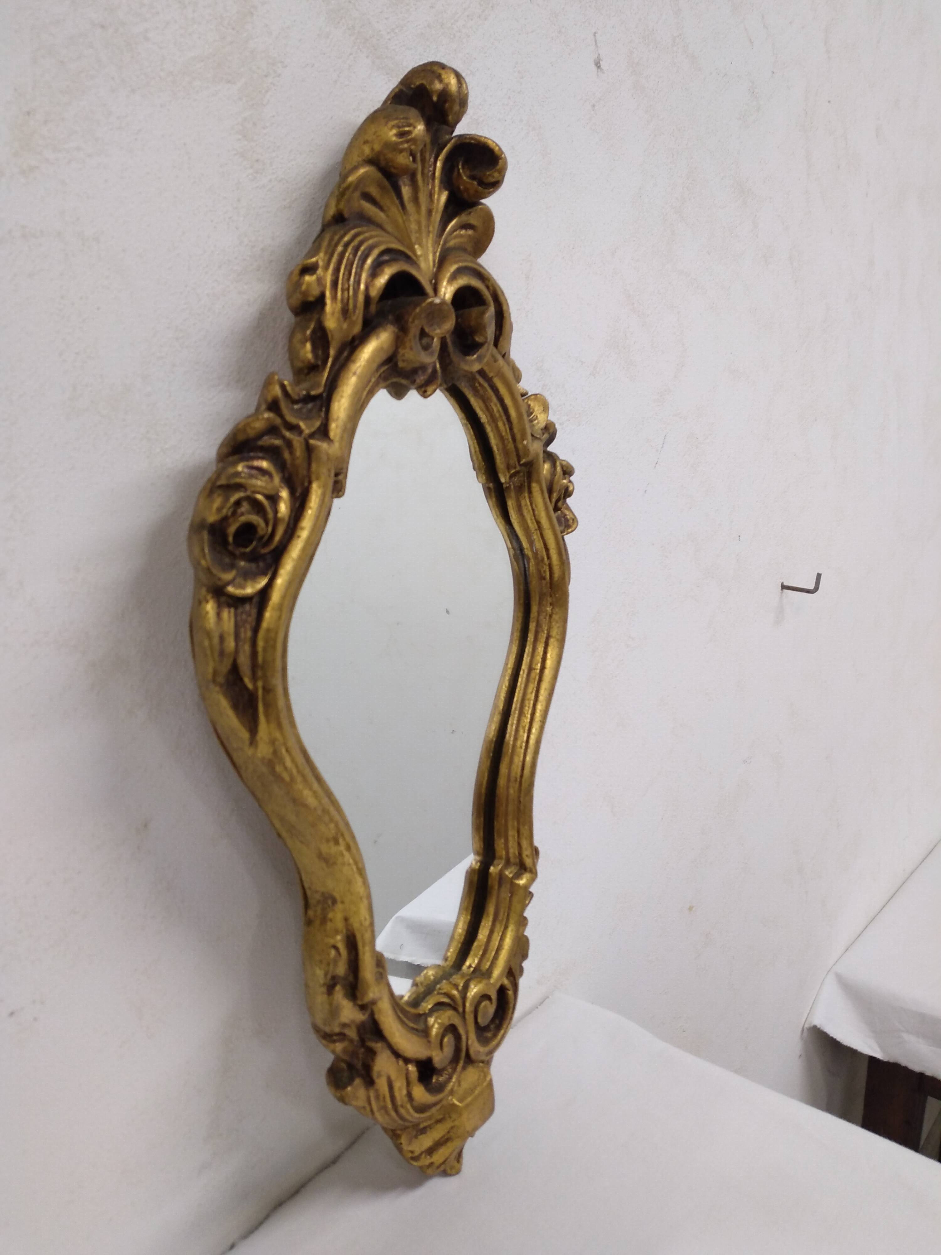 Gold stucco rocaille style mirror