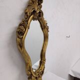 Miroir style rocaille en stuc doré