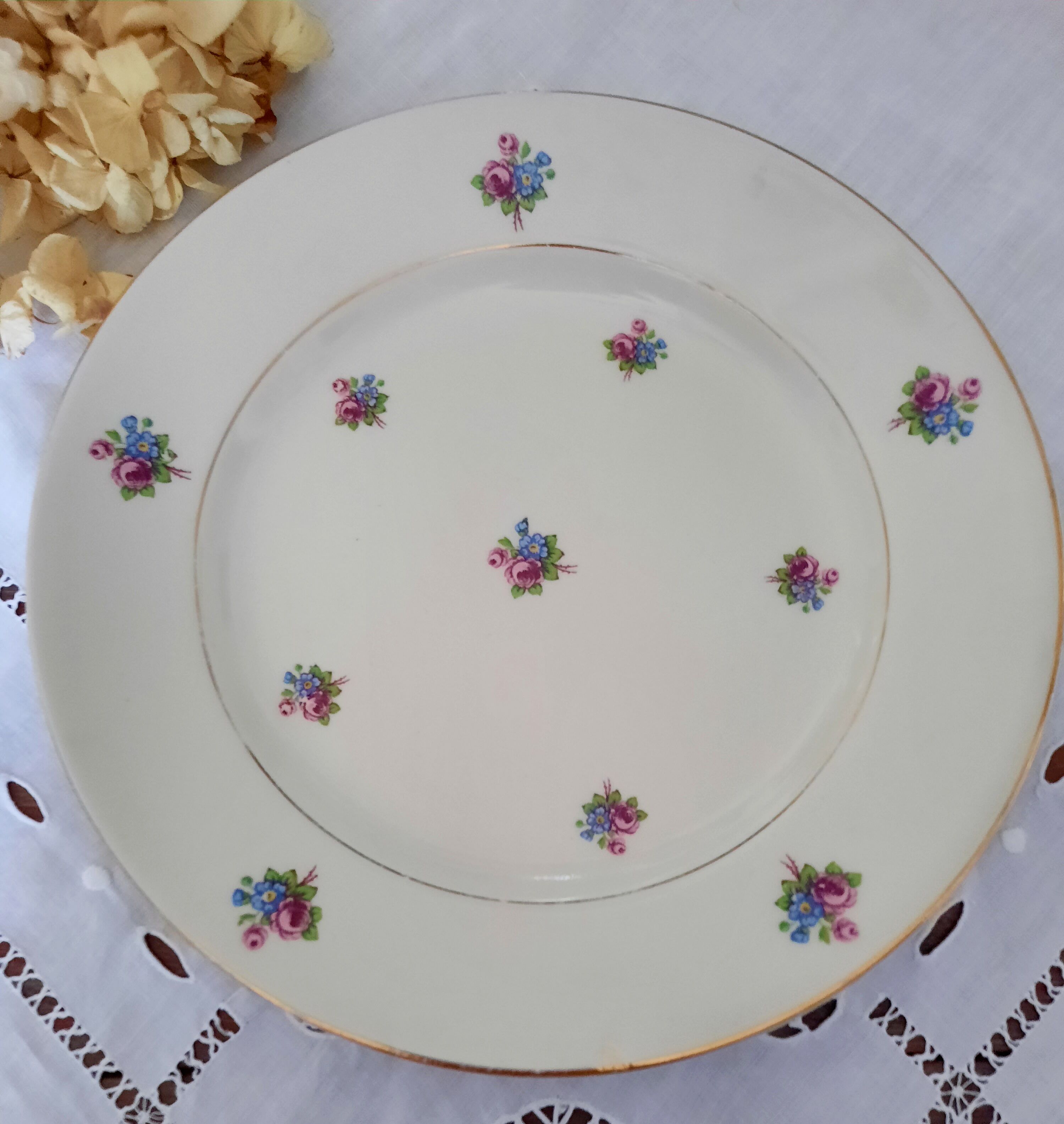 Mismatched old flat plates with gold