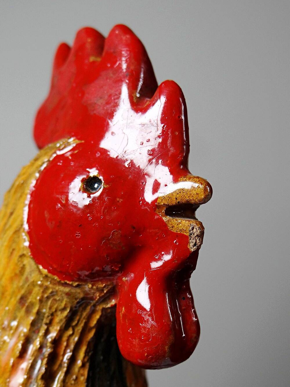 Small decorative rooster in handcrafted enameled ceramic folk art