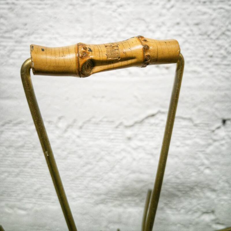 Guitar magazine rack in gold metal