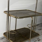Golden tubing bar and smoked glass top circa 60/70