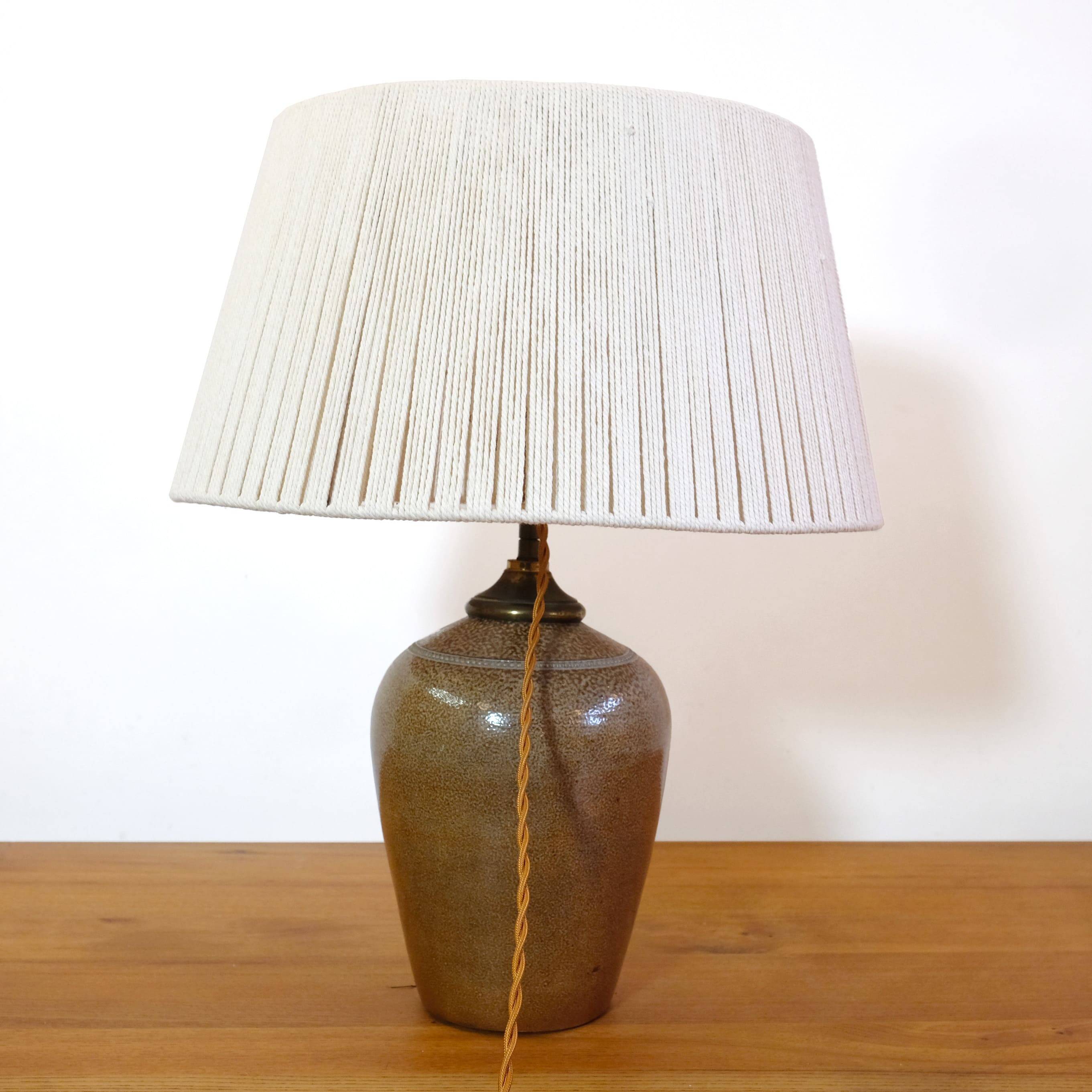 Stoneware lamp with a cotton thread shade, 1970s.