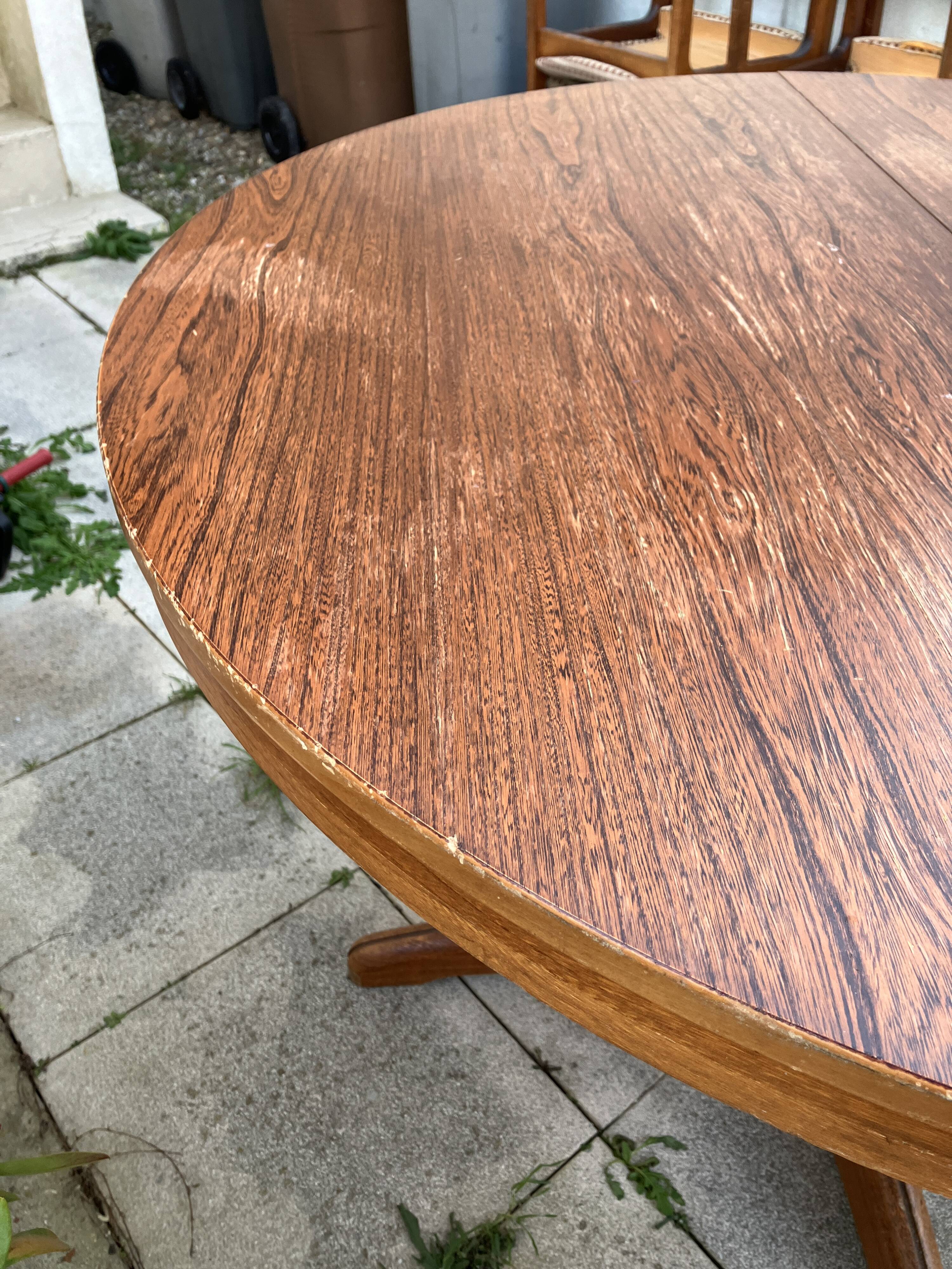 Extendable round dining table and 4 Baumann chairs.