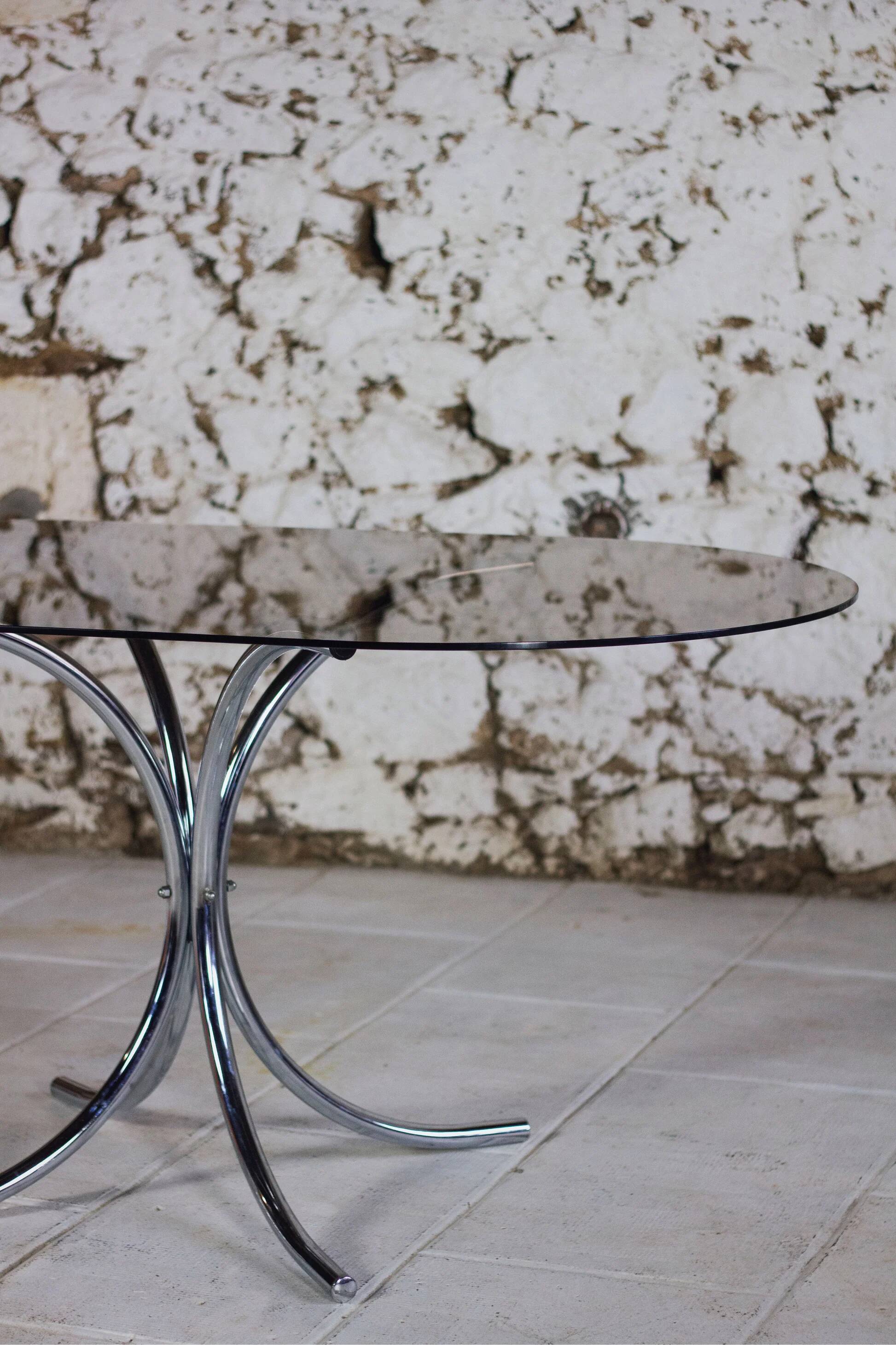 Oval dining table in chrome and smoked glass, 1970.