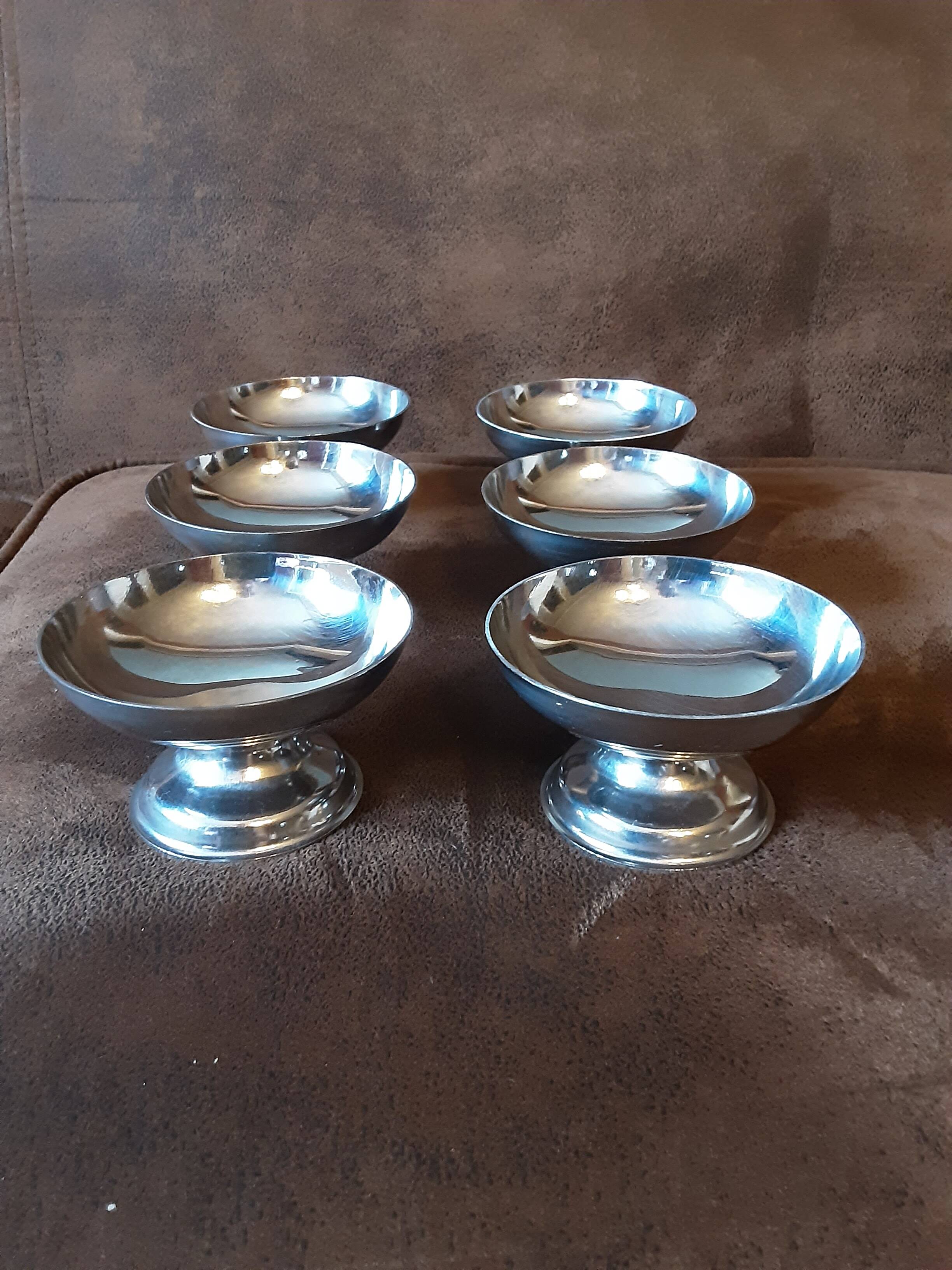 Set of 6 footed bowls. Metal