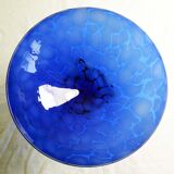 Blue glass cup on foot