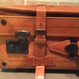 Thick leather suitcase