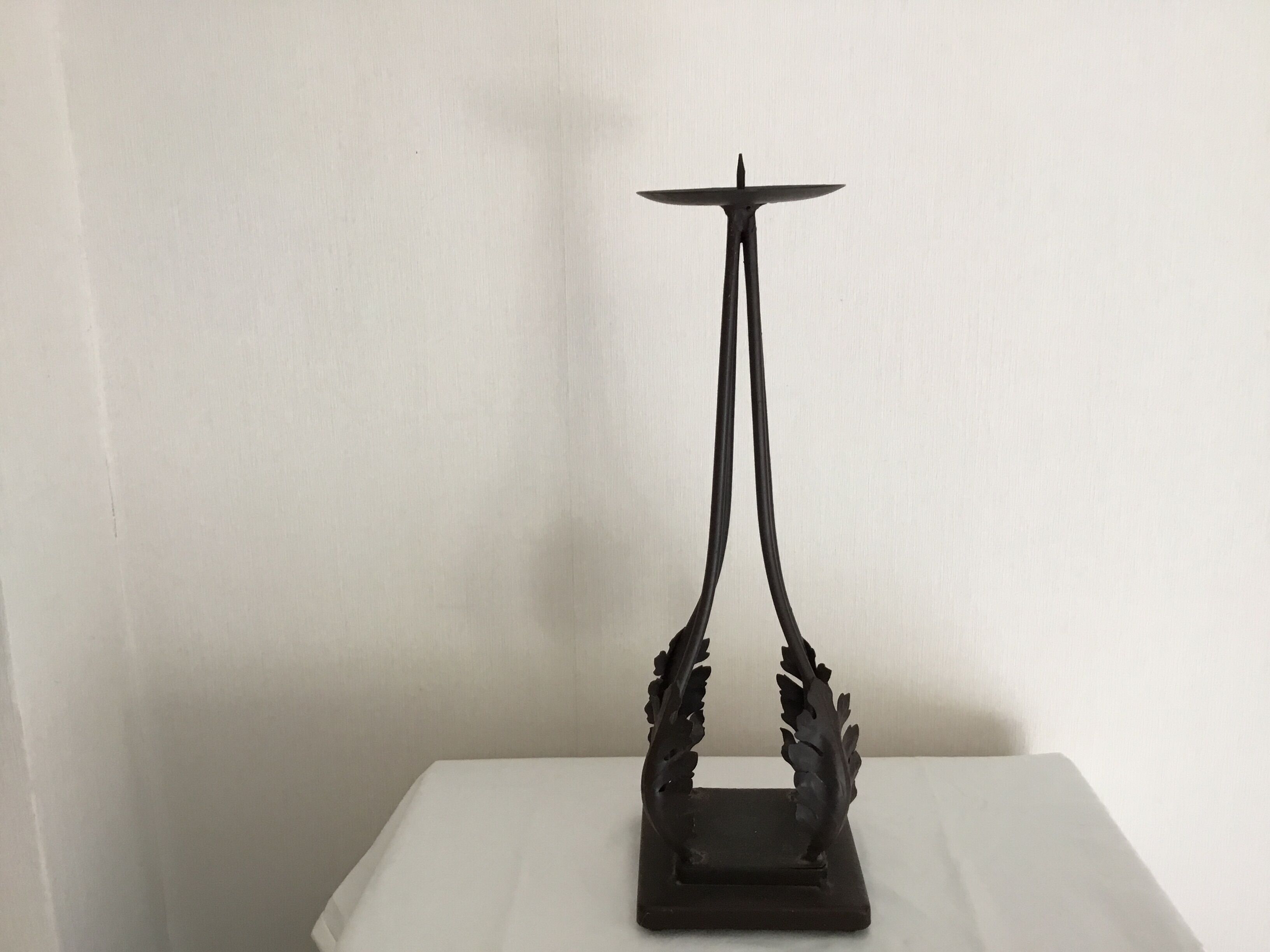 Candlestick wrought with its original candle iron