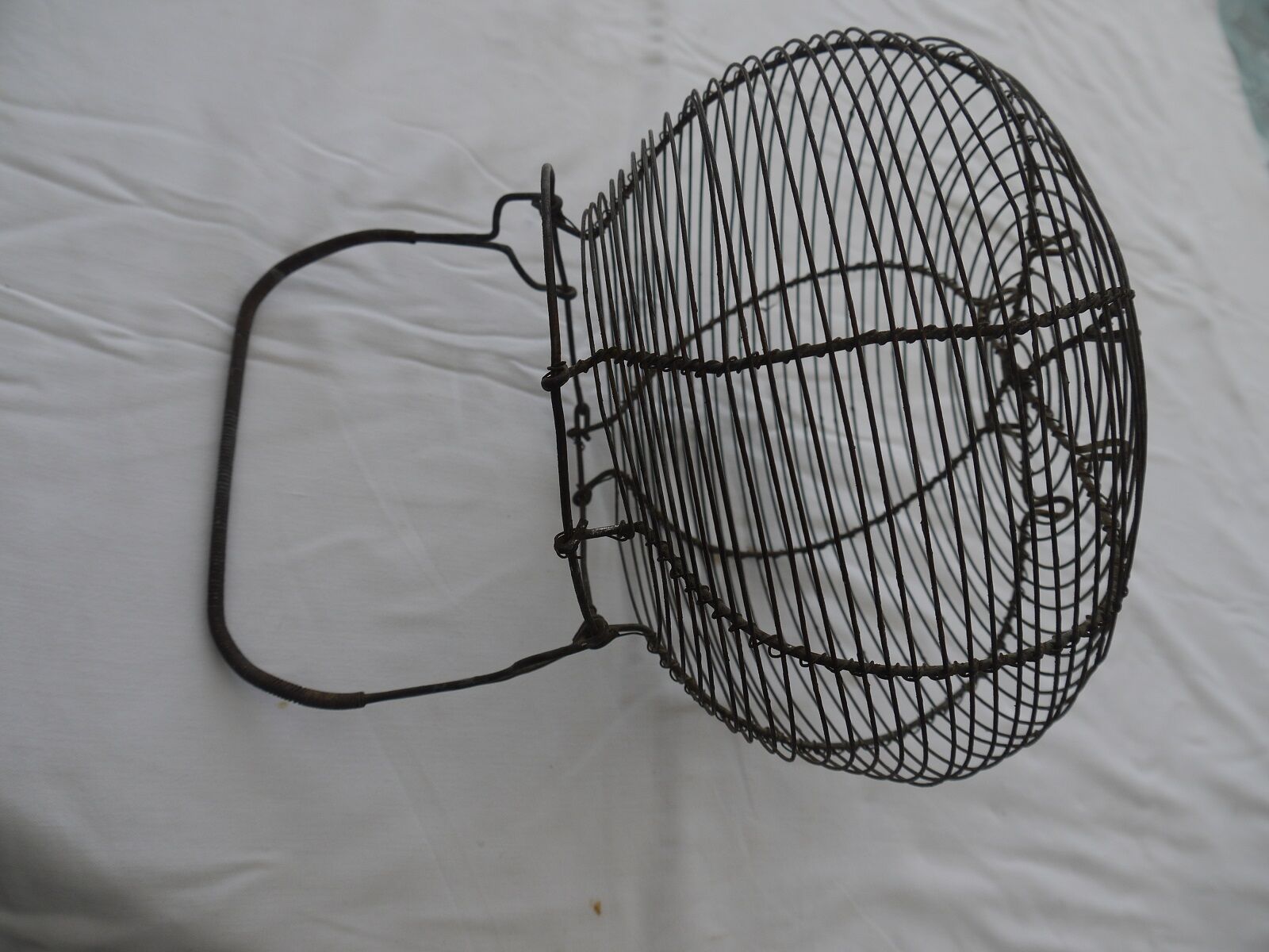 Old metal basket, egg