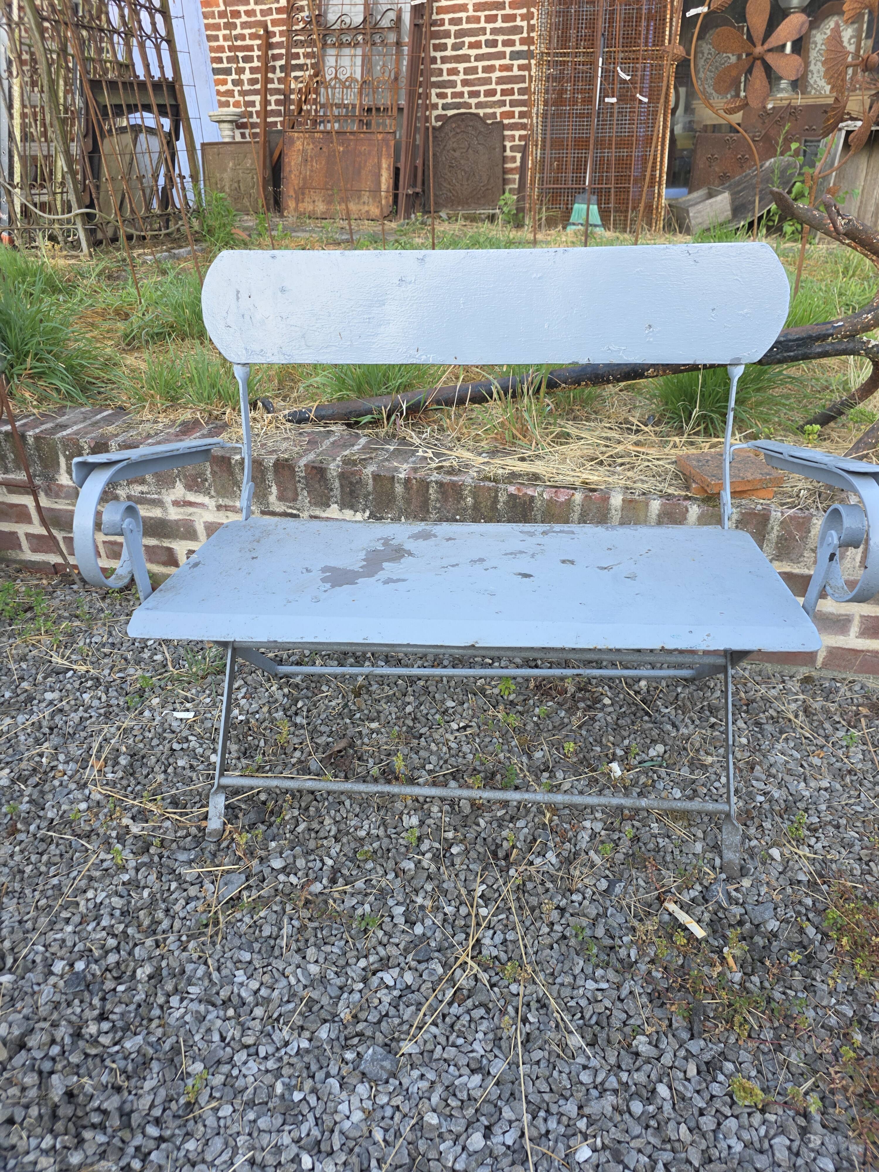 Banc de jardin ancien en fer forgé massif