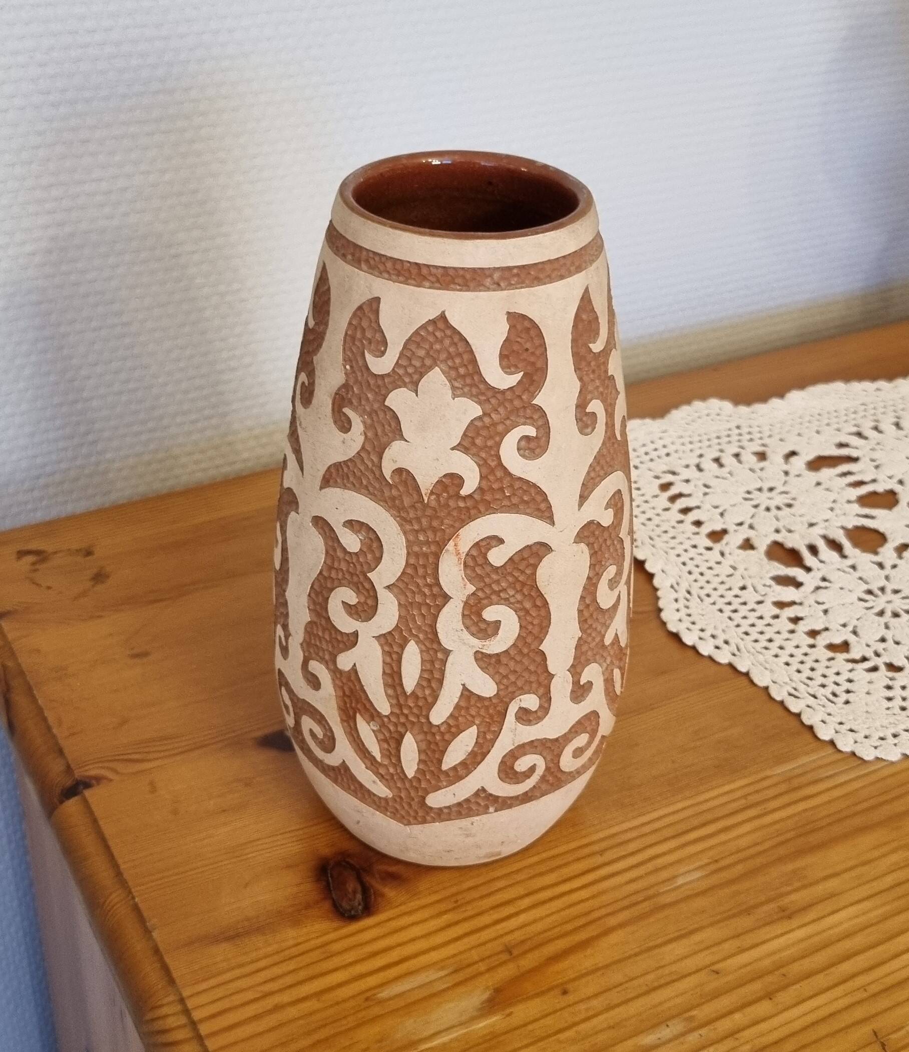 Set of 4 vases in earthenware and terracotta.