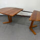 Dyrlund extendable round table in teak – Danish design – 4 to 6