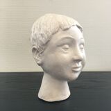 Plaster girl's head