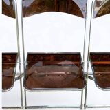 6 chaises pliantes en Plexiglas fumé et métal chrome Chaisor 1970