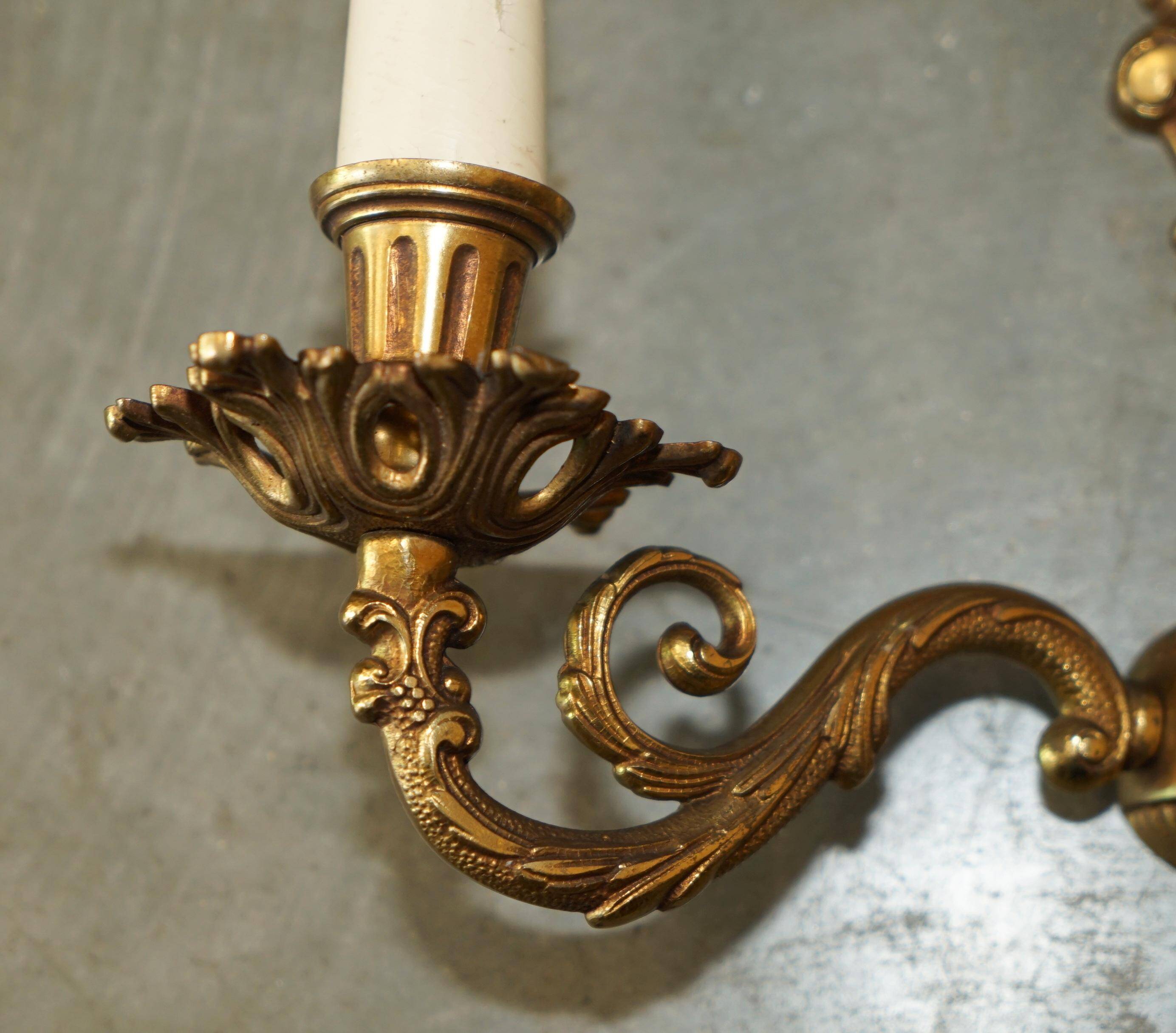 Pair of antique wall sconces in gilded bronze from the 1920s.
