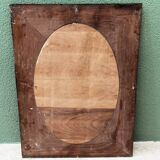 Oval mirror in beveled glass and solid mahogany