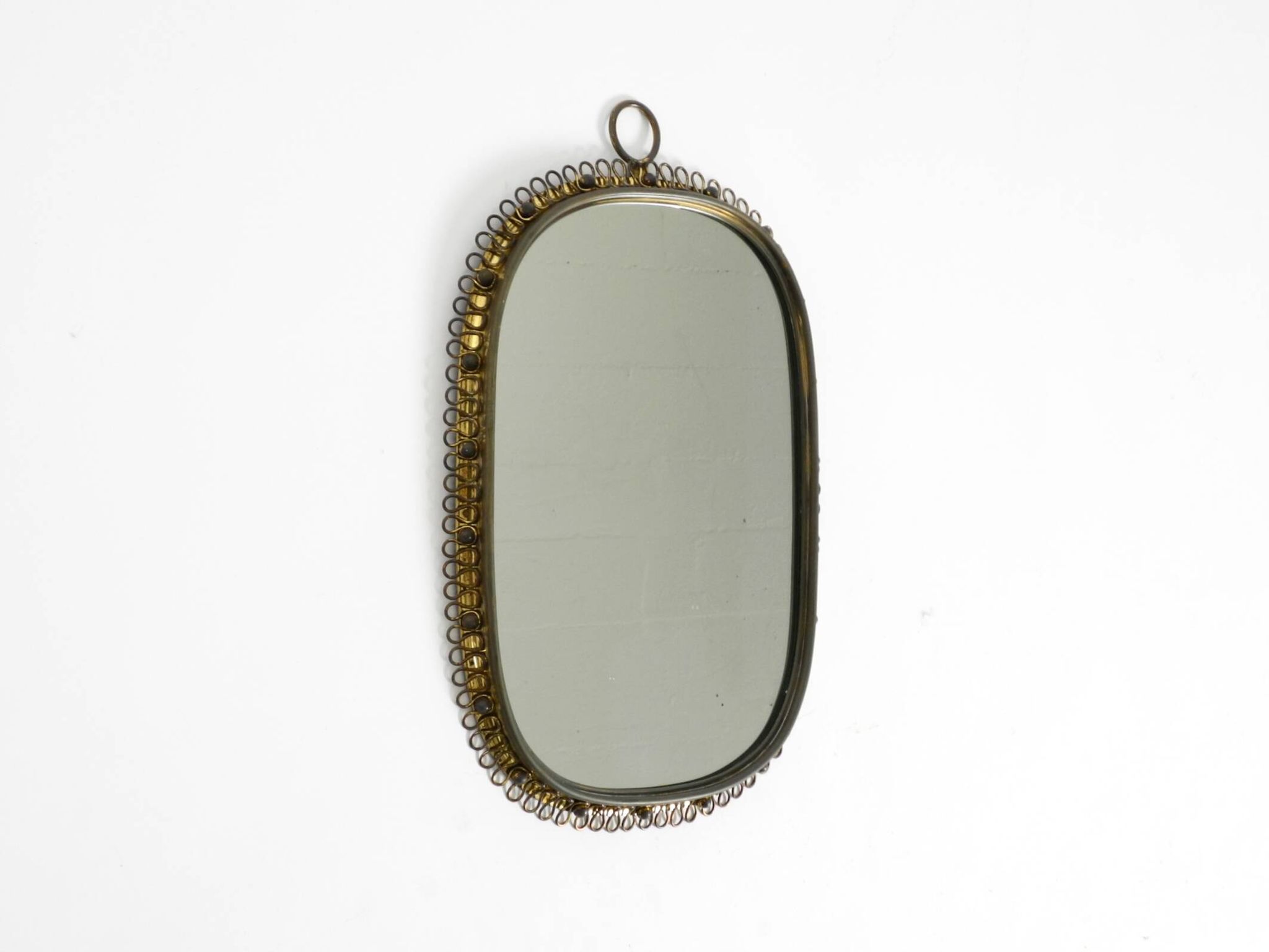 Mid century brass wall mirror by Josef Frank for Svenskt Tenn Sweden
