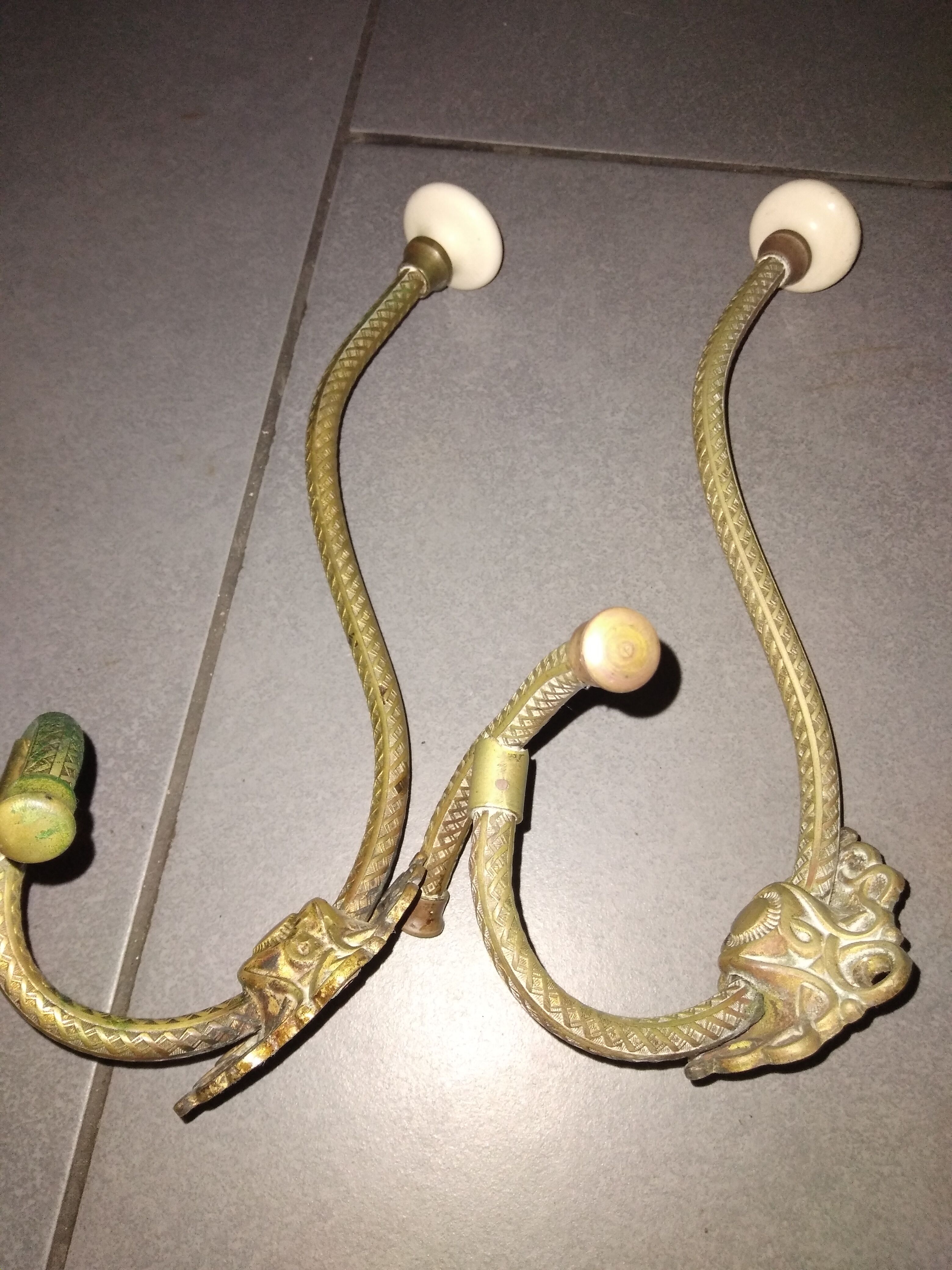 Antique metal and ceramic hooks