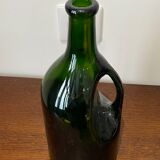 Bottle in olive glass