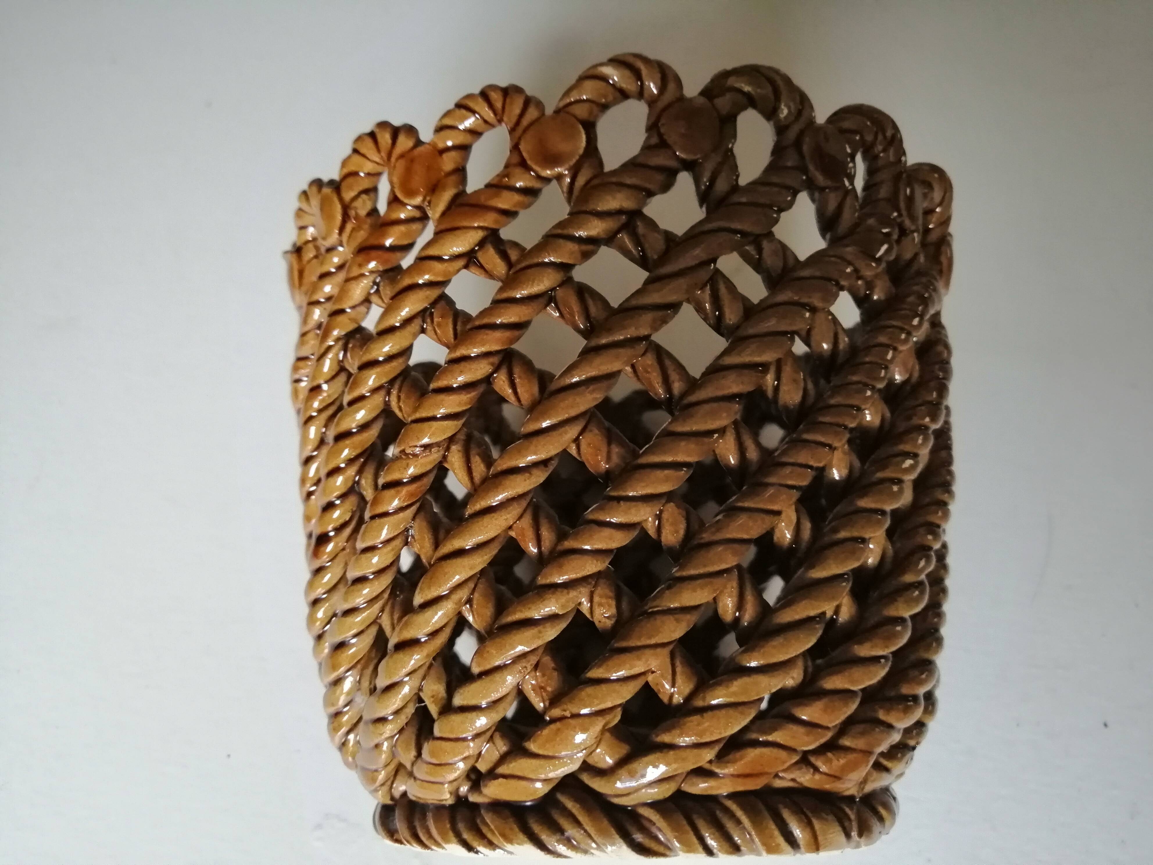 Flared braided ceramic pot cover