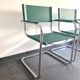 Pair of faux leather and chrome armchairs