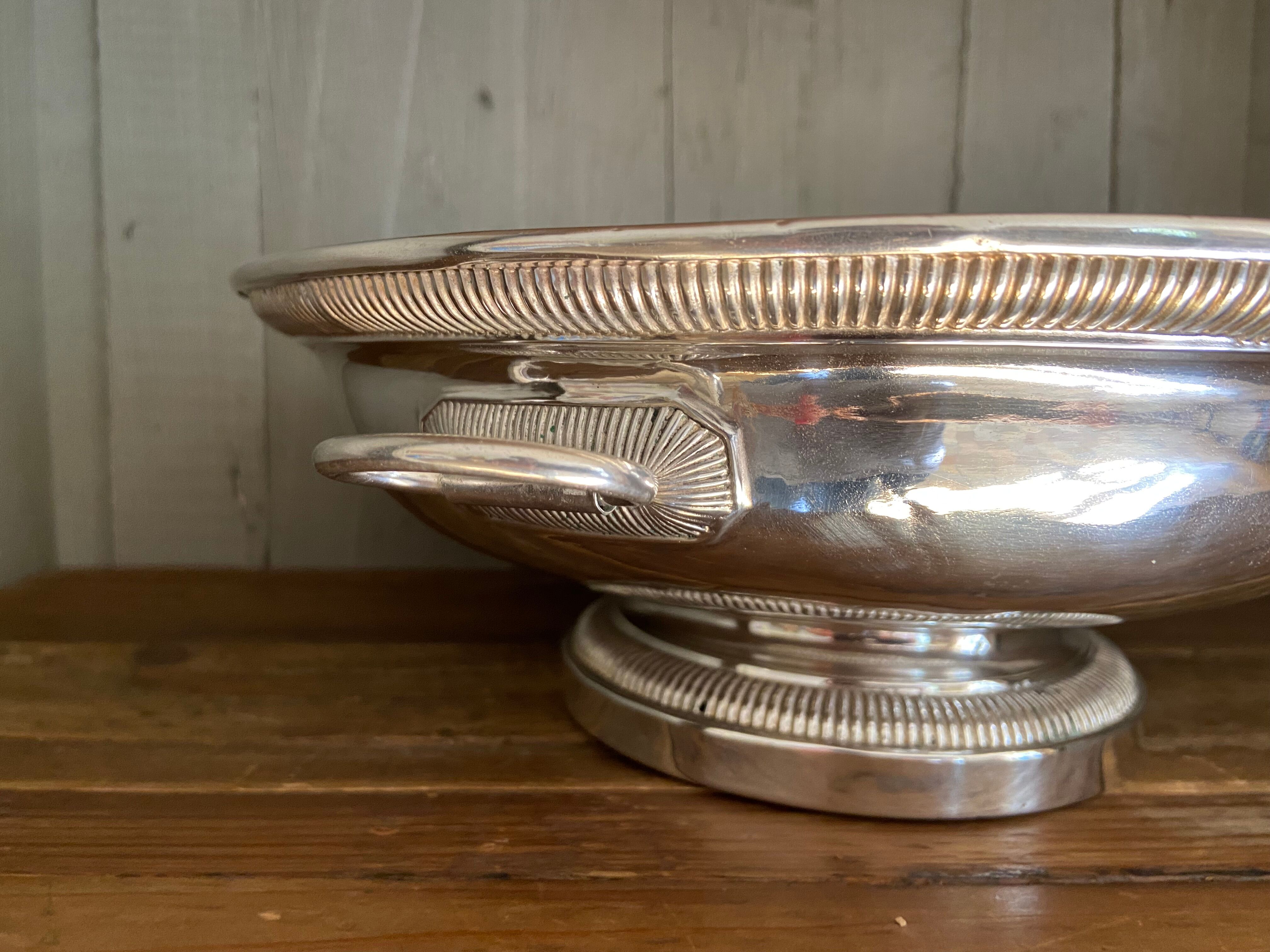 Old silver metal trivet