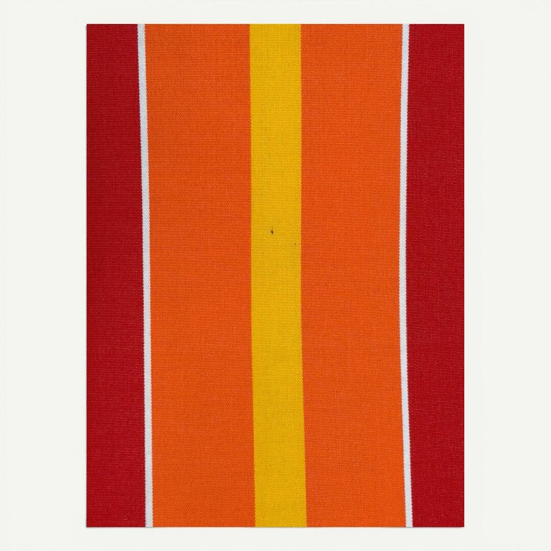 Vintage deck chair with red and orange striped fabric, original patina.