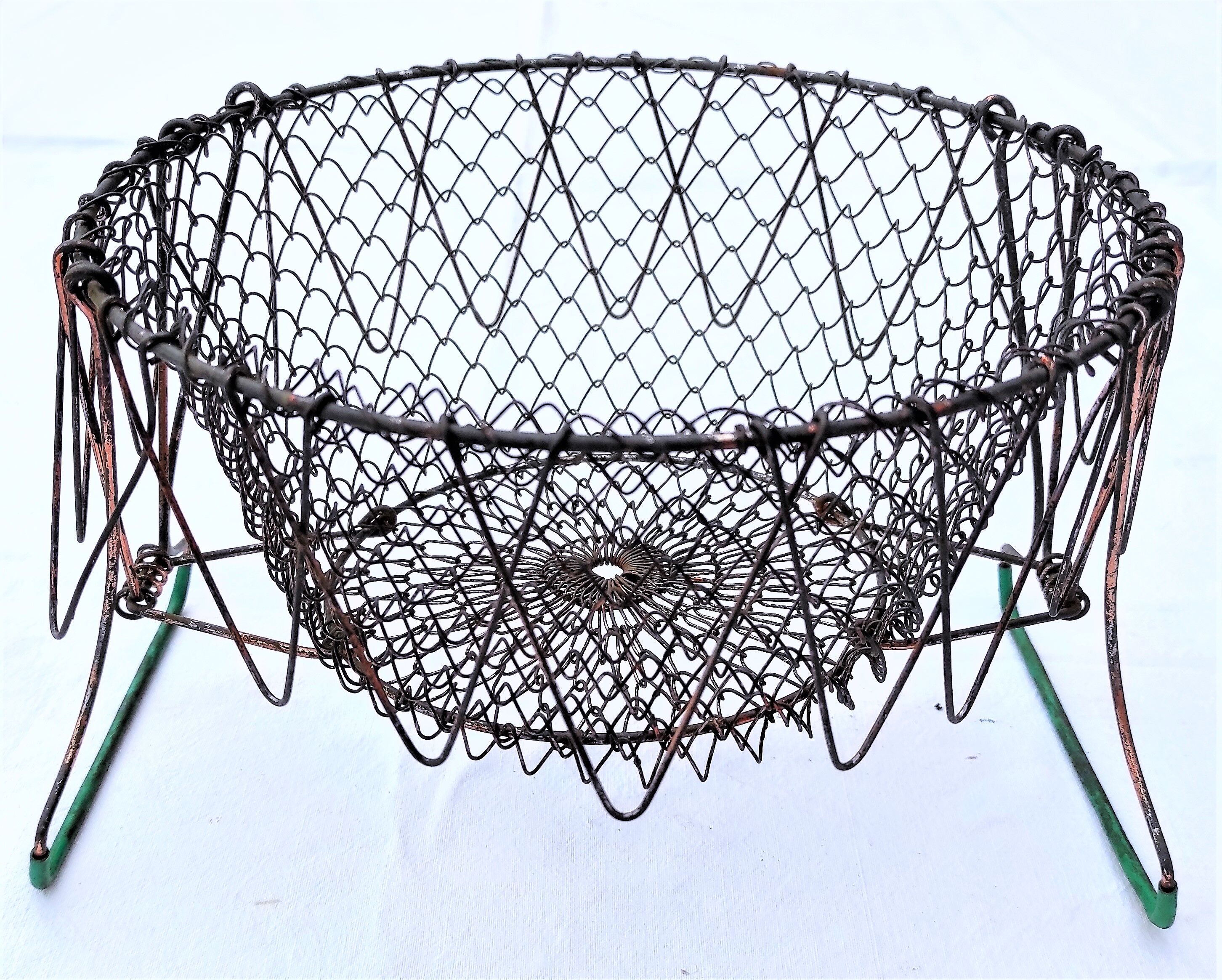Vintage folding salad basket convertible into a fruit/egg cup ... with its green handles