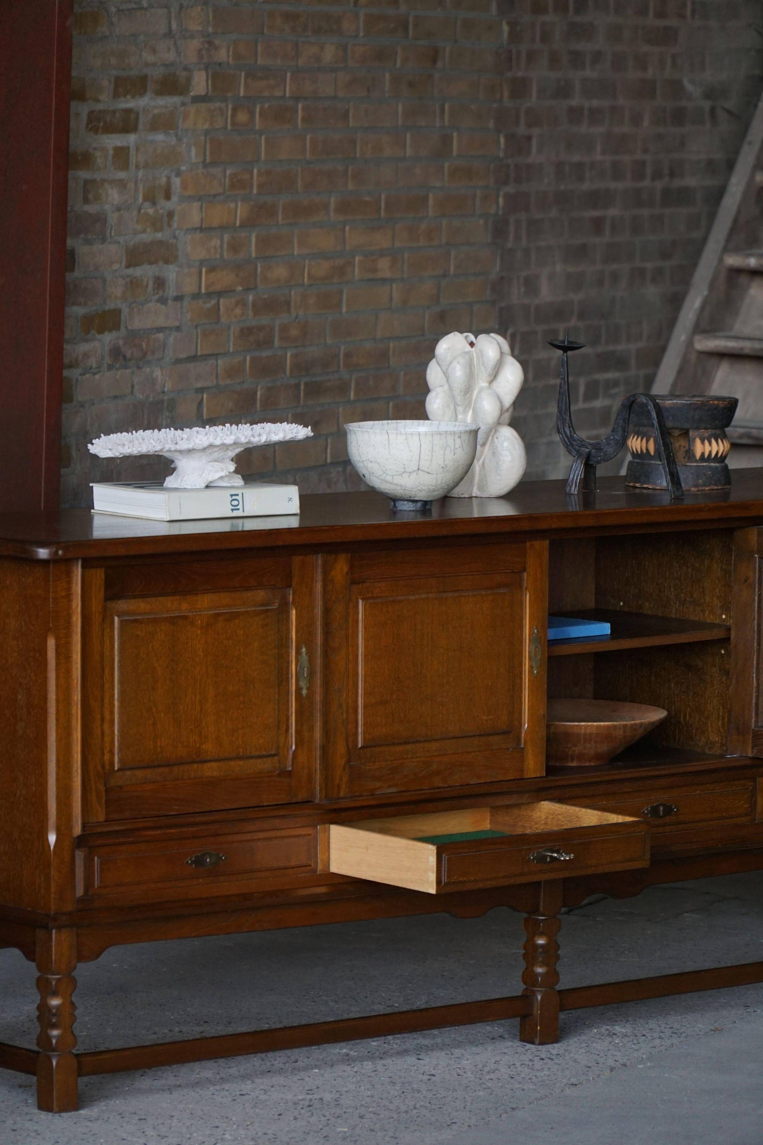 Danish enfilade from the mid-modern century in dark stained oak, 1960s.