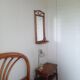 Vintage rattan entryway mirror
