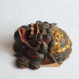 Two polychrome painted and gold leaf gilded Barong dance masks from Bali, Indonesia.