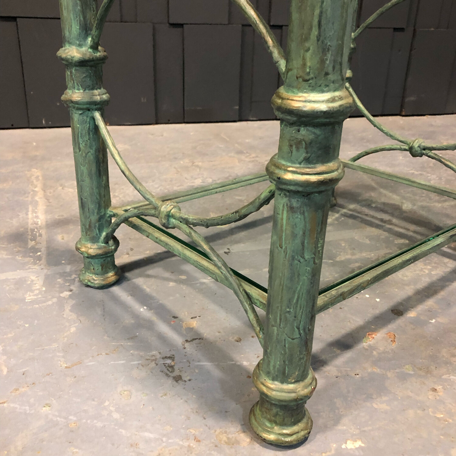 Iron and glass side table with antique patina