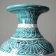 Vintage turquoise ceramic baluster vase with incised decoration.