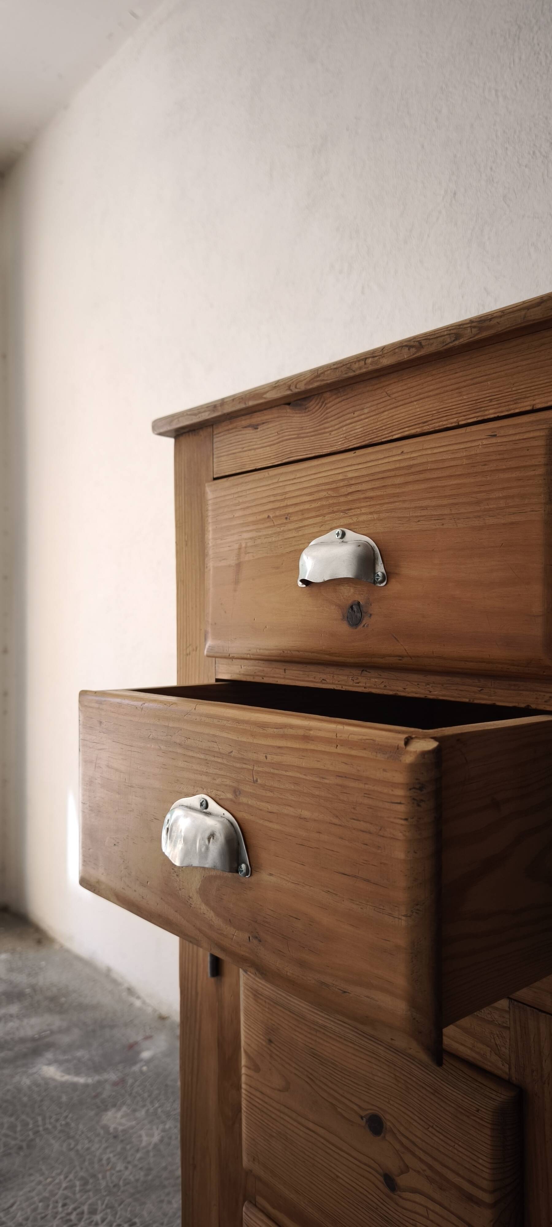 Small antique workshop furniture made of solid wood.