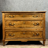 Louis XVI period chest of drawers in walnut and gilded brass nets circa 1780