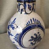 Small white decorative vase with blue floral decoration
