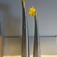 Dyptic vase in brushed chrome metal for single flowers.