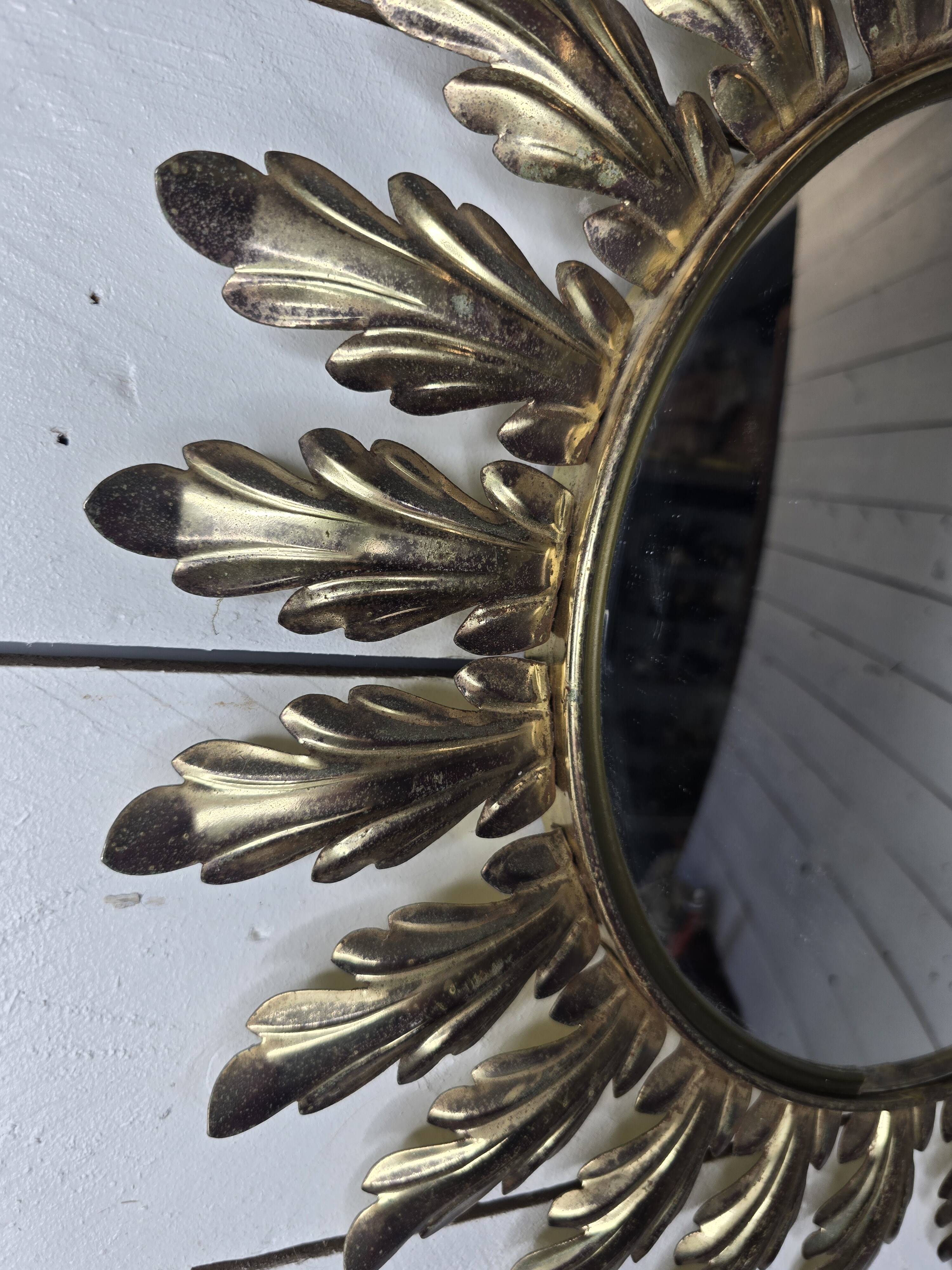 Witch's eye sun mirror in gold metal from the 60s