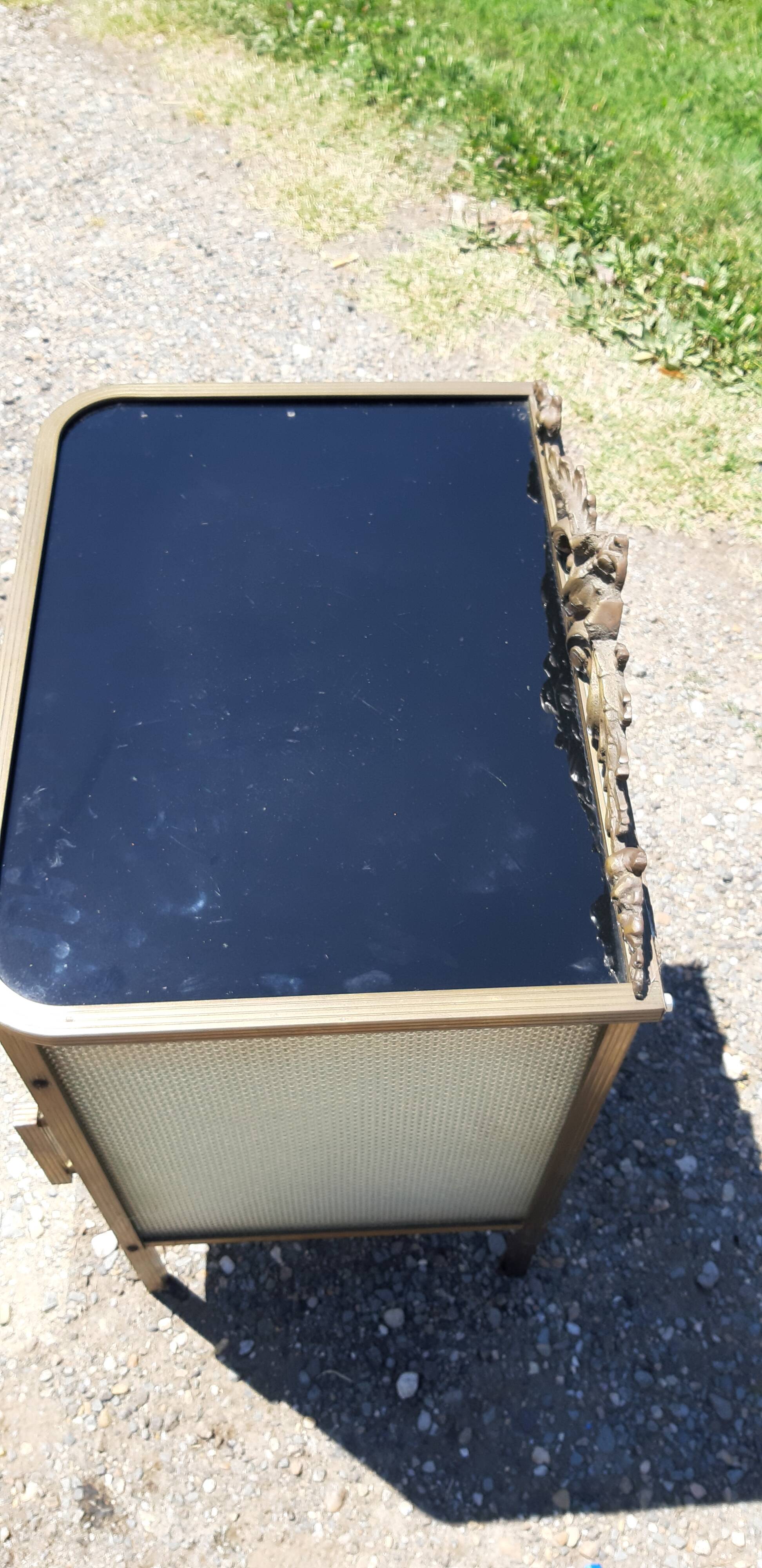 Golden metal empire style bedside