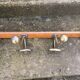 Large vintage wall coat rack with 5 brass and wood hooks – bistro