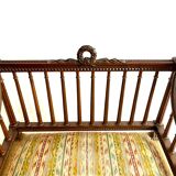 Old Louis XVI style armchair with wide seat